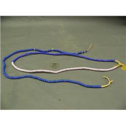 Two strands of red white and blue trade beads (3)