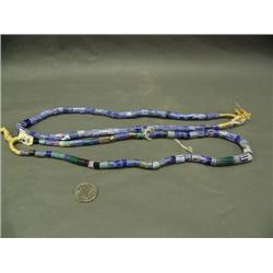 Two strands of blue and white trade beads 23" long (3)