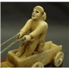 Image 3 : Walrus ivory, Eskimo made, man in wagon being pulled by a animal, very important, early, rare carvin