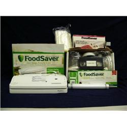 New in box: Food Saver with bags and  special attachments (241)