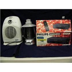 New in box: sunbeam portable bug zapper and a Delonghi osculating heater, Magnavox VCR player (241)