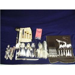 Large assortment of silver ware, serving pieces, (241)