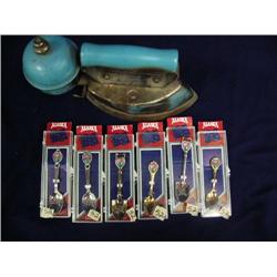 Lot of 6 collector's spoons and antique iron (241)