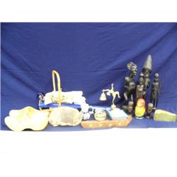 Lot of hand carved African figure, Russian doll, wooden Dutch shoes, wicker basket (241)