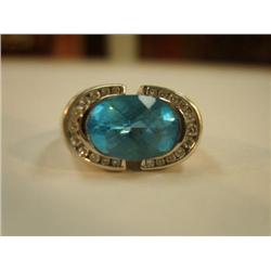 Beautiful aquamarine ring, 14K white gold, small diamonds surround aquamarine, total weight .3 oz st