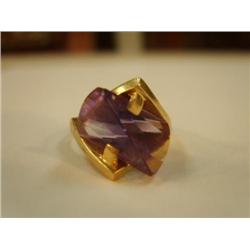 Amethyst and gold ring, unhallmarked gold And amethyst ring, contemporary style (241)