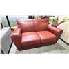 Image 1 : RED LEATHER LOVESEAT