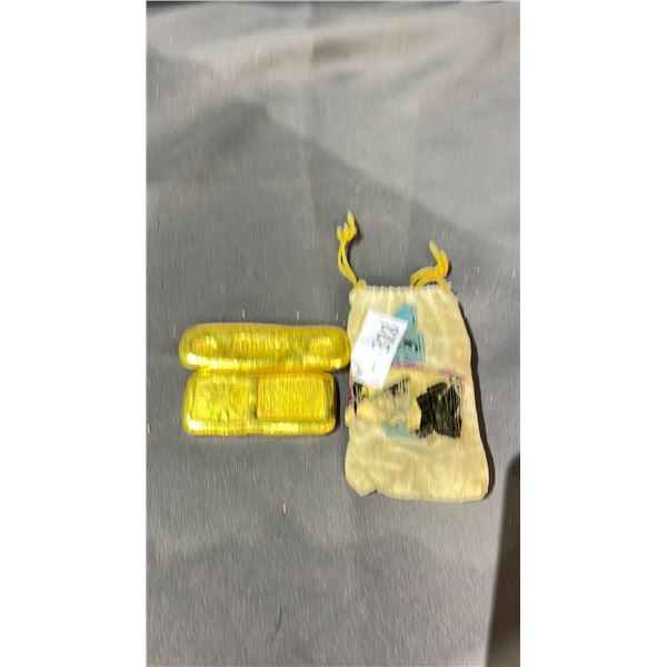 BAG OF ORIENTAL STAMPED PAPER WEIGHTS
