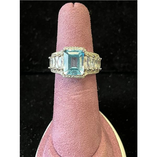 625S 4.0 CARAT EMERALD CUT SWISS BLUE TOPAZ RING WITH BAGUETTE SIDESTONES, MOUNTED IN 925