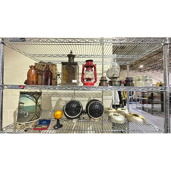 2 SHELVES OF ASSORTED COLLECTIBLES INCLUDING; OIL LANTERNS, BALL SPEAKERS, ANTIQUE FIRE ALARMS &