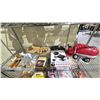Image 1 : SHELF OF ASSORTED ITEMS INCLUDING; FPV CAMERA FOLDING DRONE, FIGURINES, CHARCUTERIE KNIFE SET &