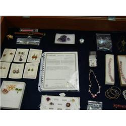 Entire case of jewelry including: 14 caret gold ring with diamonds, silver ring with Smokey topaz, s