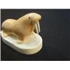 Image 2 : 2.5" fossilized walrus mounted on white ivory base by Aningayou (3)