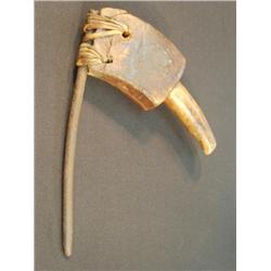 old Eskimo artifact ads with wooden handle and an iron spike, may have been recovered from driftwood