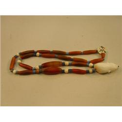 CHOICE ON 2: Carved ivory polar bear pendants mounted on old trade bead necklace (3)