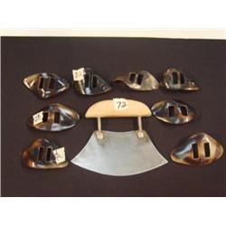 Lot of 8 caribou hoof buckles and an Ulu with wood handle (3)