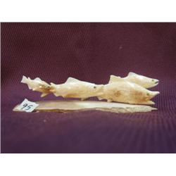 Imported lot of 4 swimming salmon made out of fossilized ivory (2)