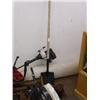 Image 5 : Hose with reel, old outboard motor, weed whacker, shovel, tow bar, set of box end wrenches, vice and