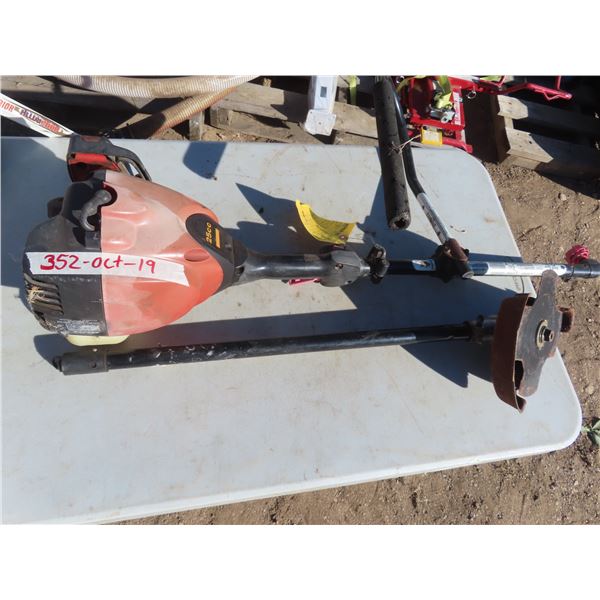 25cc craftsman weed whacker RUNS with metal blade and standard attachment