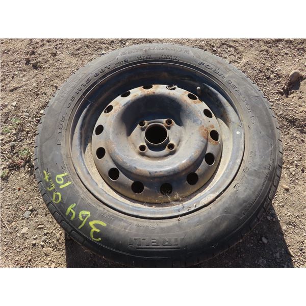 Pirelli 185-65-R15 tire on 4 bolt steel rim