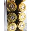 Image 8 : 4 full boxes of shotgun ammunition . + five .270 rounds and 12 .270 rounds