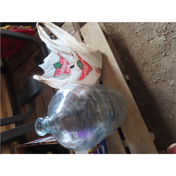 water jug, bike handle bars and large light bulb