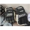 Image 6 : hockey helmets , pants , socks , gloves , size m and youth large