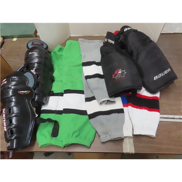 youth hockey pants size youth large , socks and shin guards