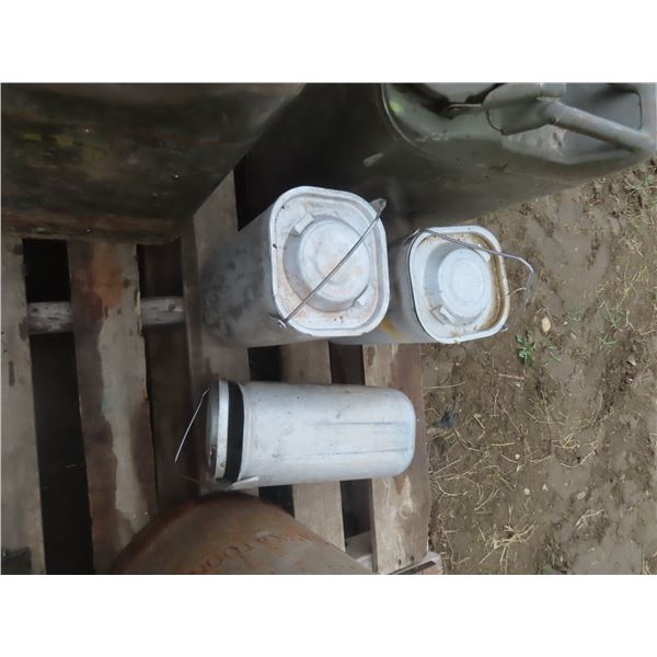three aluminum army cans