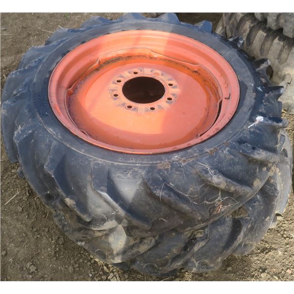 two 9.5-24 tractor tires