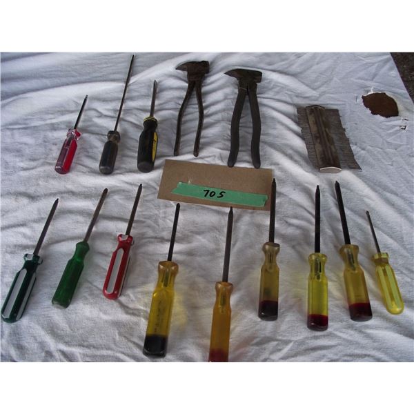 Assorted screw drivers and Pliers. (15) Pieces