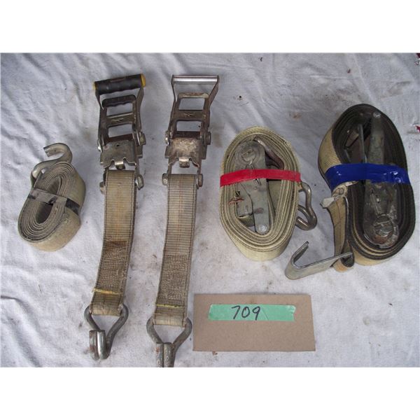 Three complete ratchet straps, approx. 20 feet each and one spare ratchet.