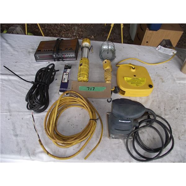 Trouble lights, 1  working & 1 that needs cord (include) along with spare bulb. Palm sander & clock 