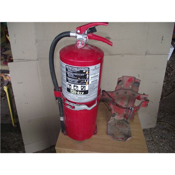 1 -20 lb fire extinguisher (as new condition), and 1- 10 lb ext. cradle.