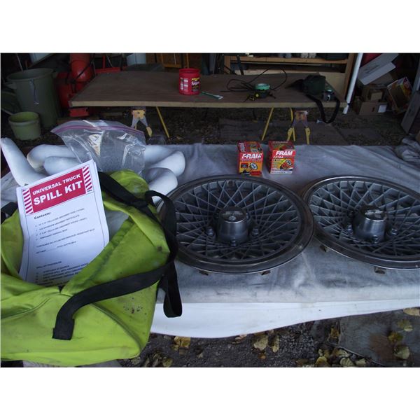2-Chev Caprice Hub Caps, 2- new Oil Filters, 1-Oilfeild Spill Kit.
