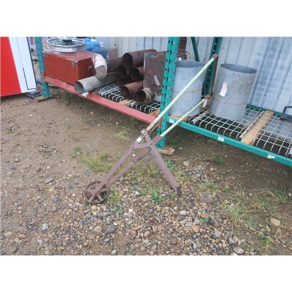 antique push weeder