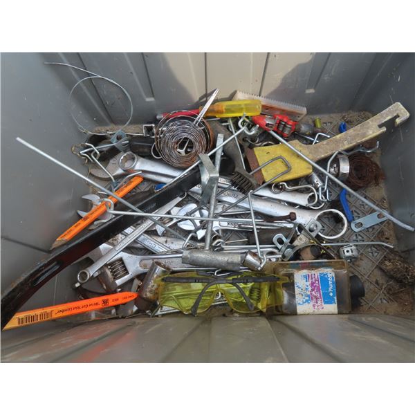 tote with wrenches , screw drivers , hardware