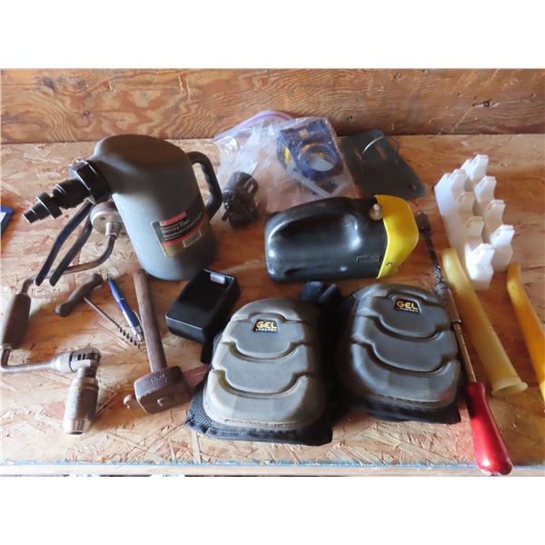 battery filler , hole saw kit , knee pads , hand drill