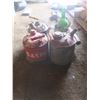 Image 3 : 3 vintage gas cans and a oil jug and glass bottle