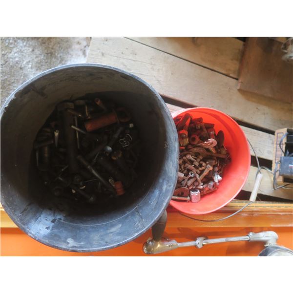 two buckets of bolts