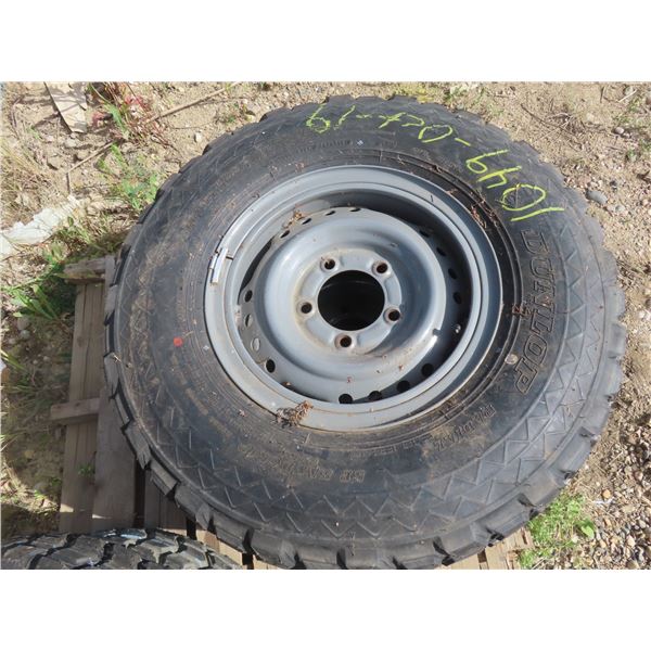 two 5 bolt split rims w/new SP sandgrip 7.50-R16 radials