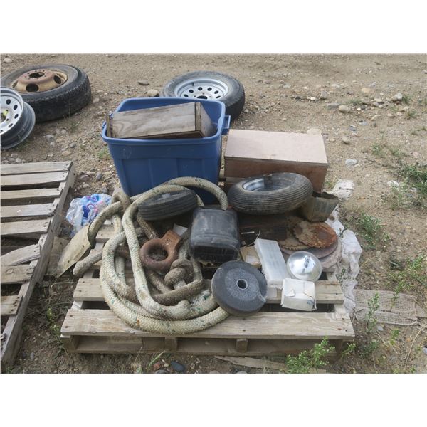 pallet of small tires and rope etc.