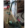 Image 1 : weed eater and fishing net