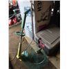 Image 3 : weed eater and fishing net