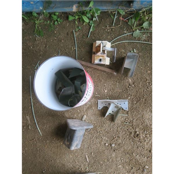 bucket of assorted hardware