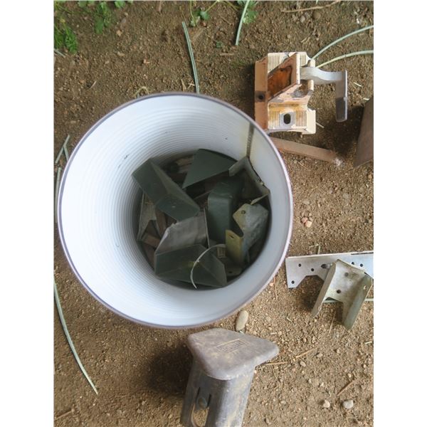 bucket of assorted hardware