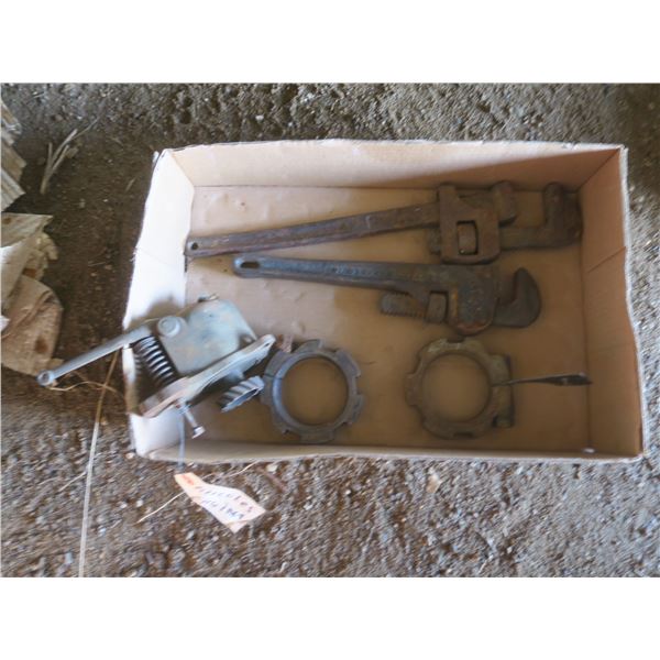 2 pipe wrenches and a Hercules engine