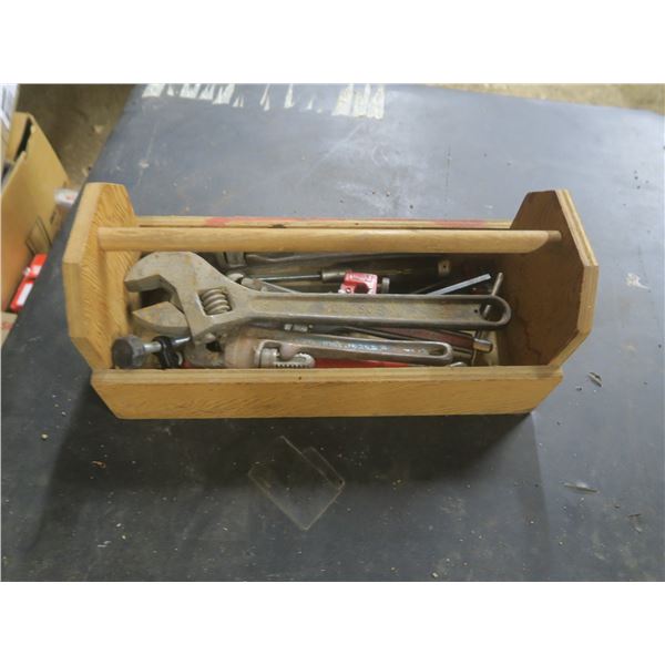 wooden toolbox with tools