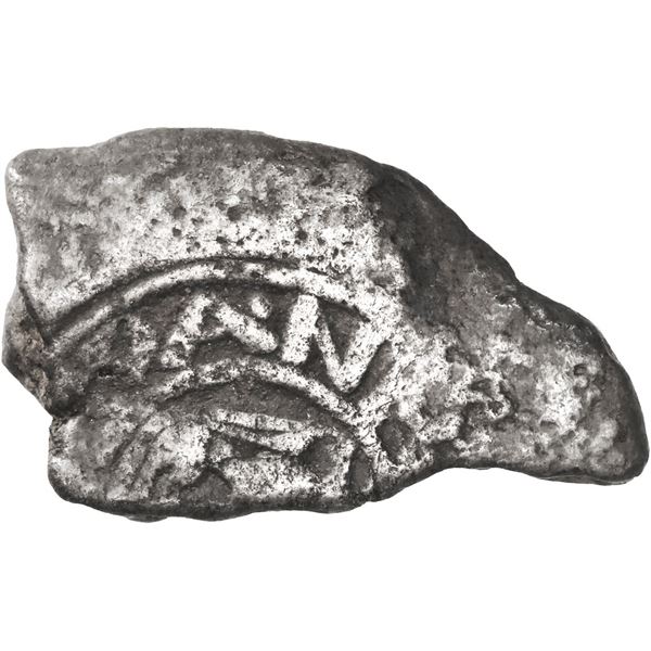 Small silver "plata corriente" piece cut from a "splash" ingot with partial tax stamp, 11.81 grams, 