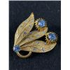 Image 1 : Vintage Gold Tone and Blue Rhinestone Brooch. Signed Continental
